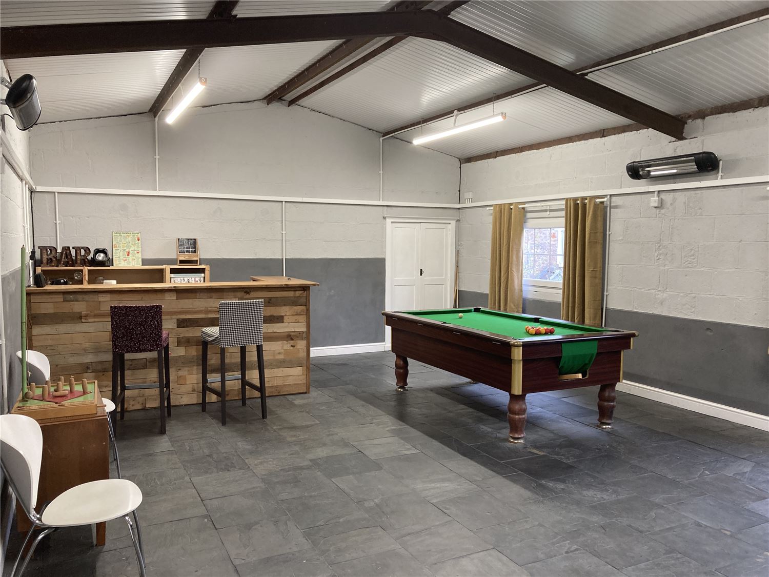 Games room at the Old Coach House, Nettlebridge.  Pool table and bar games